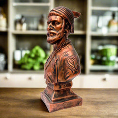 A beautiful Shivaji Maharaj murti decorated with a unique oxidized copper paint.