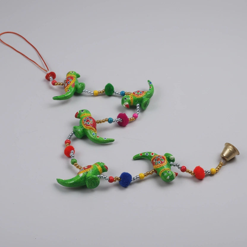 Papermache parrot toran hanging on room door, vibrant home entrance decoration