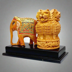 Wooden pen stand with painted elephant sculpture and Ashoka Pillar design.
