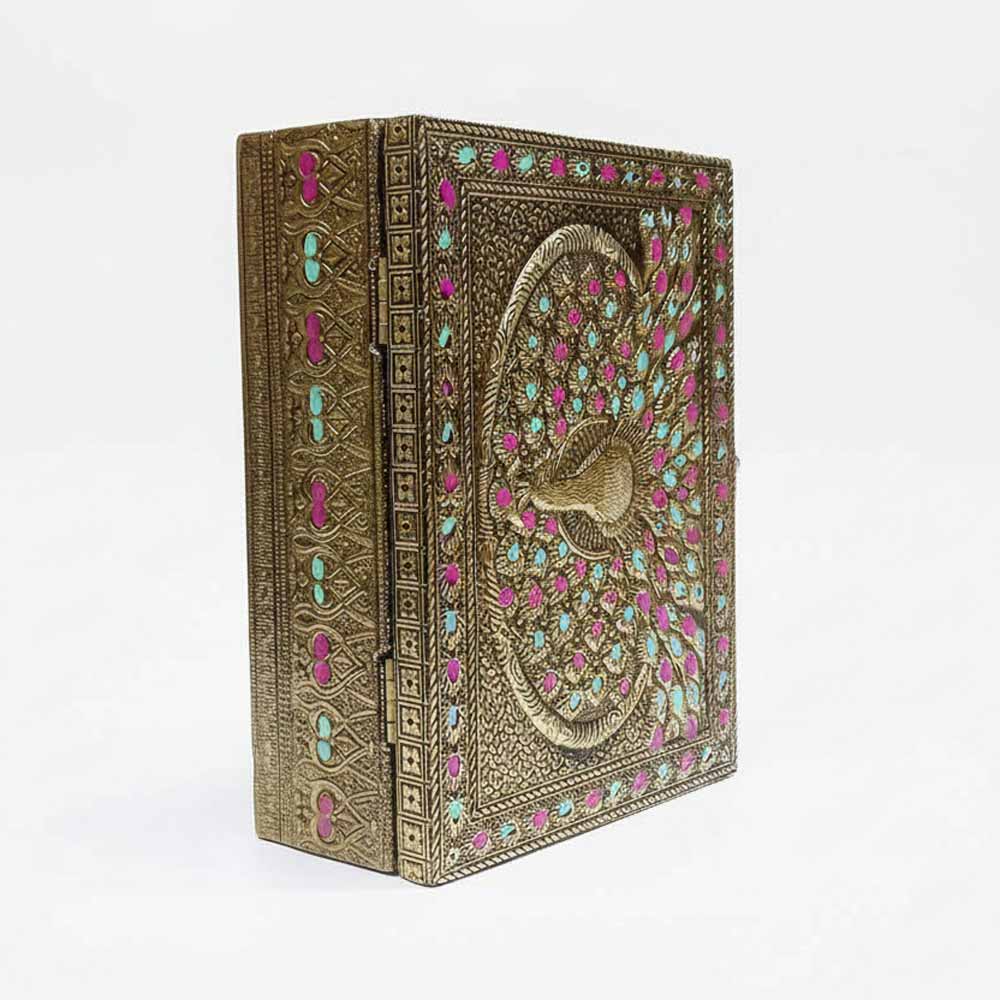 Side angle of handcrafted peacock meenakari wooden gift box with vibrant green and pink accents.