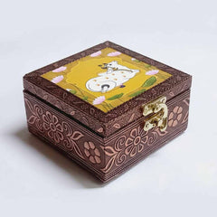 Front view of Pichwai Krishna motif on oxidized copper wooden jewellery box