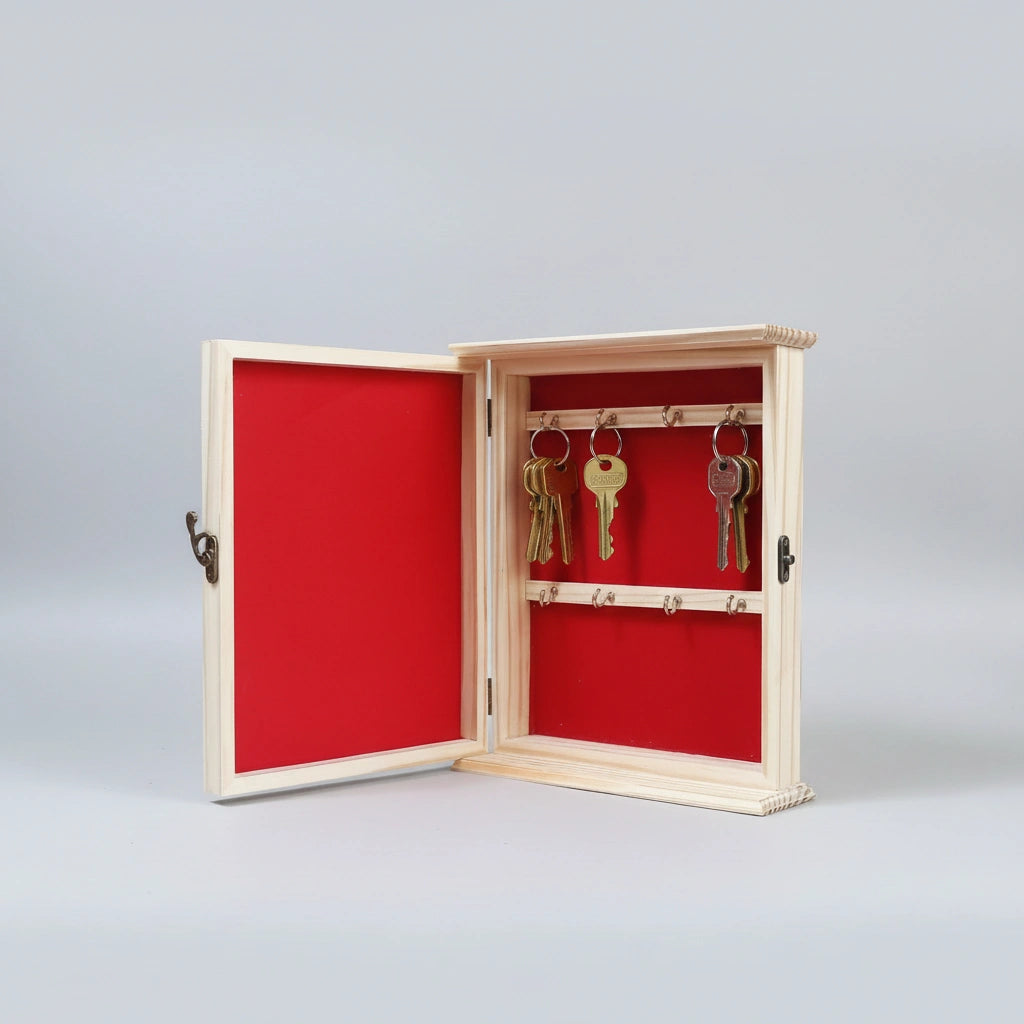 Inside view of 10.5x8.5 inch pine wood key holder with red velvet lining and 8 metal hooks.