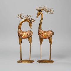 Premium quality metal deer showpiece with integrated candle holder for luxury interiors.