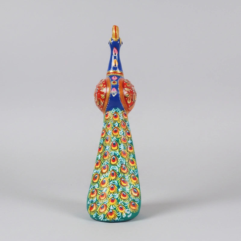 Close-up of shimmering vitreous enamel feathers on a premium metal peacock statue by KK Gift Store.