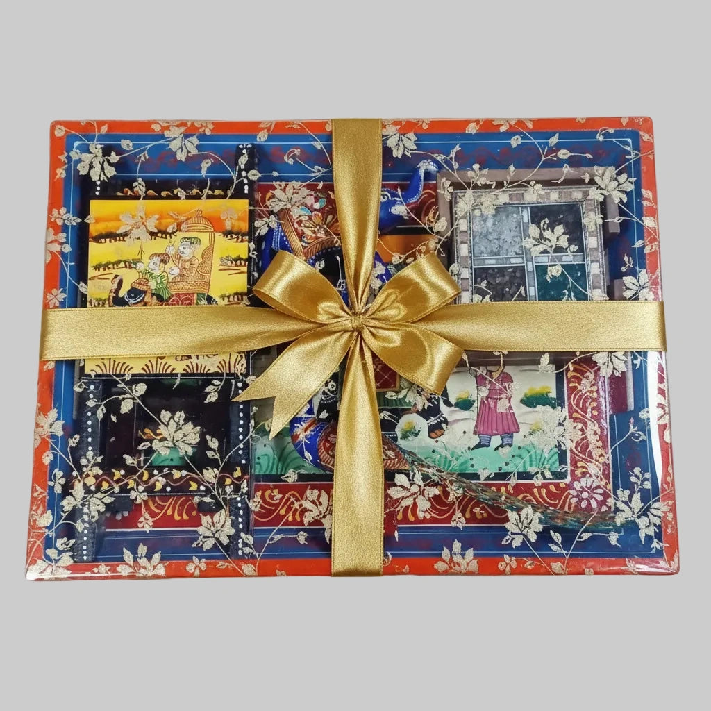Rajasthani handcrafted office gift set professionally packed in a premium printed transparent gift wrap for corporate gifting.