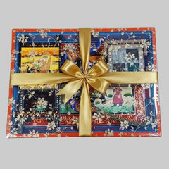 Rajasthani handcrafted office gift set professionally packed in a premium printed transparent gift wrap for corporate gifting.