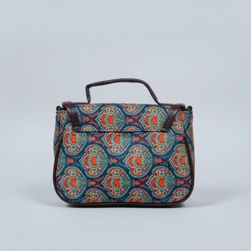 back of the premium PU leather top handle on the floral fabric bag