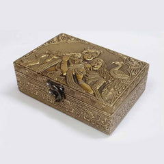 Lifestyle display of Radha Krishna golden wooden gift box as wedding or puja decor.