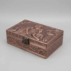 Premium wooden gift box with embossed Radha Krishna copper design and floral border on lid.