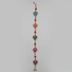 Handmade 3 feet Rajasthani heart-shaped wall hanging with multi-color beads and metal bell.