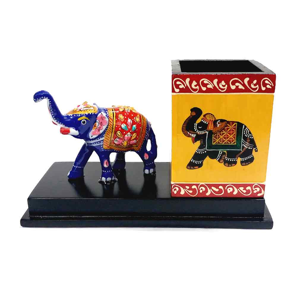 A traditional Rajasthani stationery holder with a hand-painted elephant.