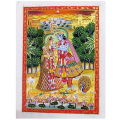 A Rajasthani miniature painting of Radha and Krishna, hand-painted on pure silk.
