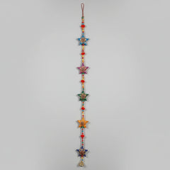 3 feet long handmade Rajasthani star-shaped wall hanging with hand-painted stars and decorative brass bell.