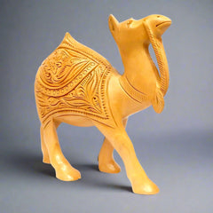 A Rajasthani wooden camel figurine, a unique and thoughtful gift item.