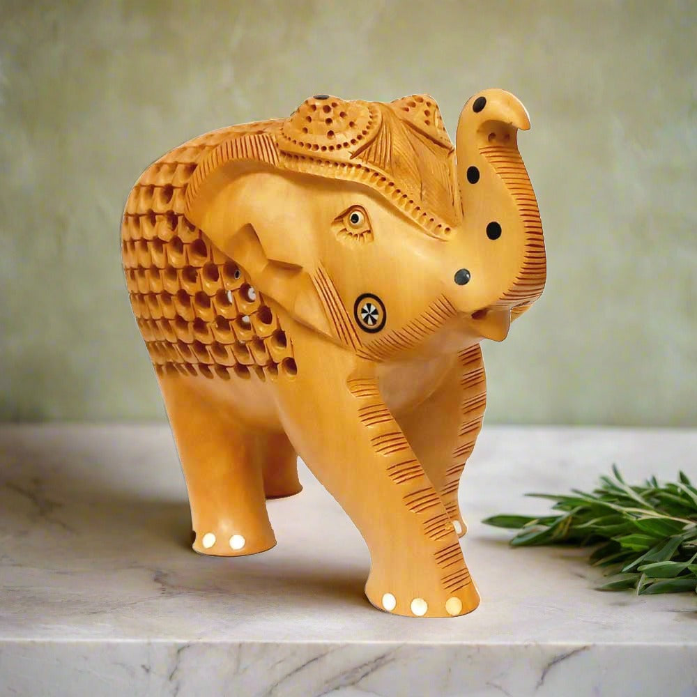 Rajasthani wooden elephant sculpture with delicate inlay work on trunk, cheeks and hooves.