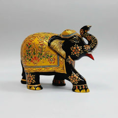 Rear view of salute elephant showpiece showing intricate gold embossed saddlecloth