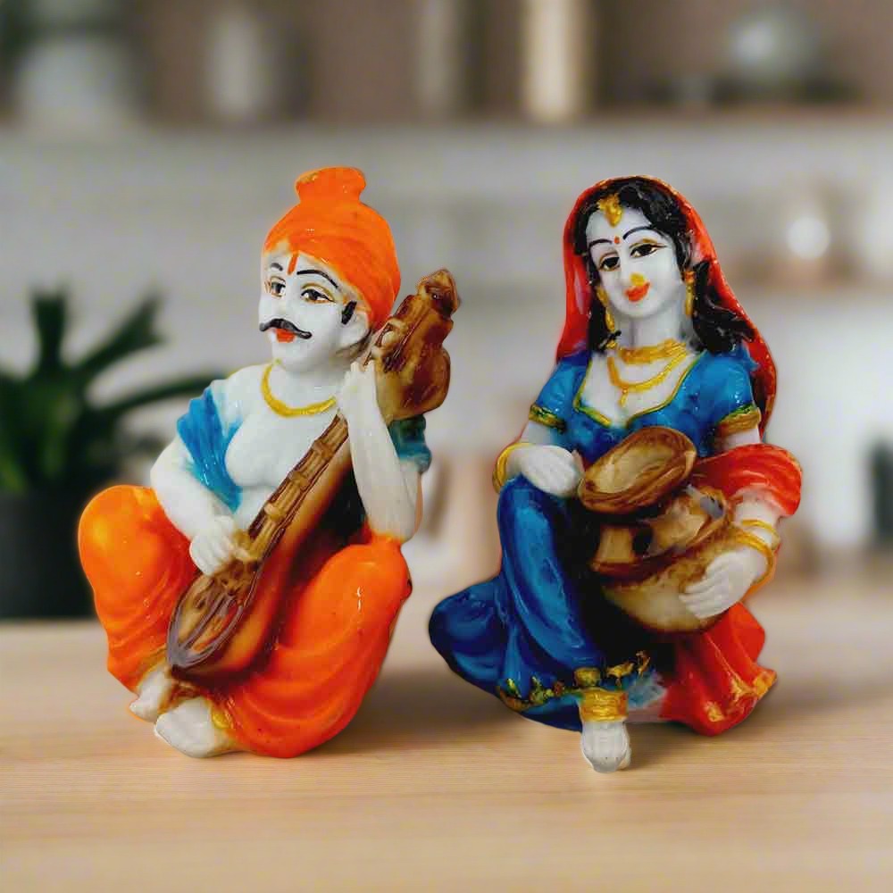 Bold and vibrant Rajasthani couple figurines, handcrafted and hand-painted showpieces