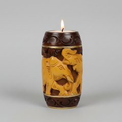 10cm round wooden candle stand with hand-carved elephant and floral motifs.