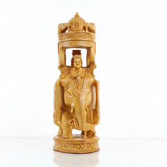 Round-shape wooden elephant statue with two kings seated in a traditional Howdah.