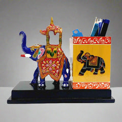 A royal Ambabari elephant pen stand, crafted with intricate details and ideal as a gift.