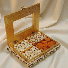 Interior of a 9x7 inch Meenakari box showing 4 equal partitions for sweets and dry fruits with a golden closure.