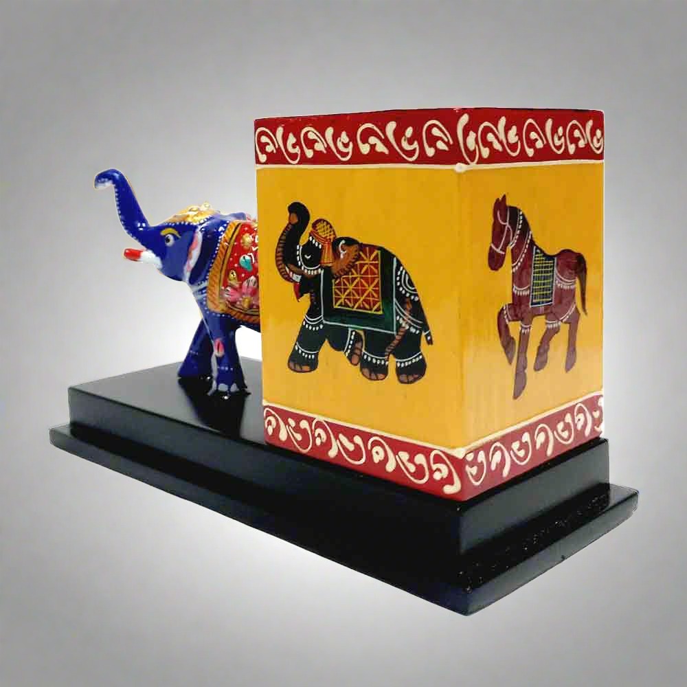 A royal Meenakari elephant pen holder, crafted with intricate details and ideal as a gift.