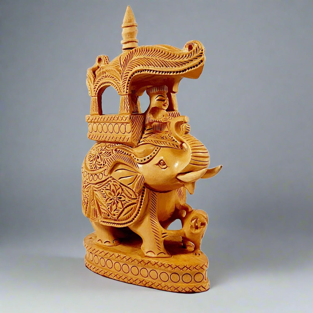A royal wooden elephant statue, a piece of historical decor that symbolizes strength and grandeur.