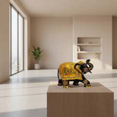 Side angle of 8x6x3 inch premium black gold wooden salute elephant statue