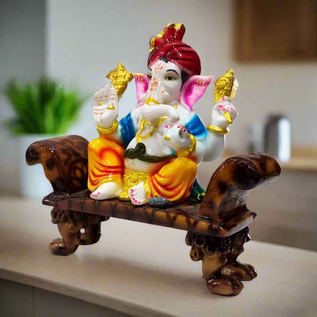 Hand-painted Ganesha idol with a creative twist, symbolizing joy and peace, perfect for home or office decor.