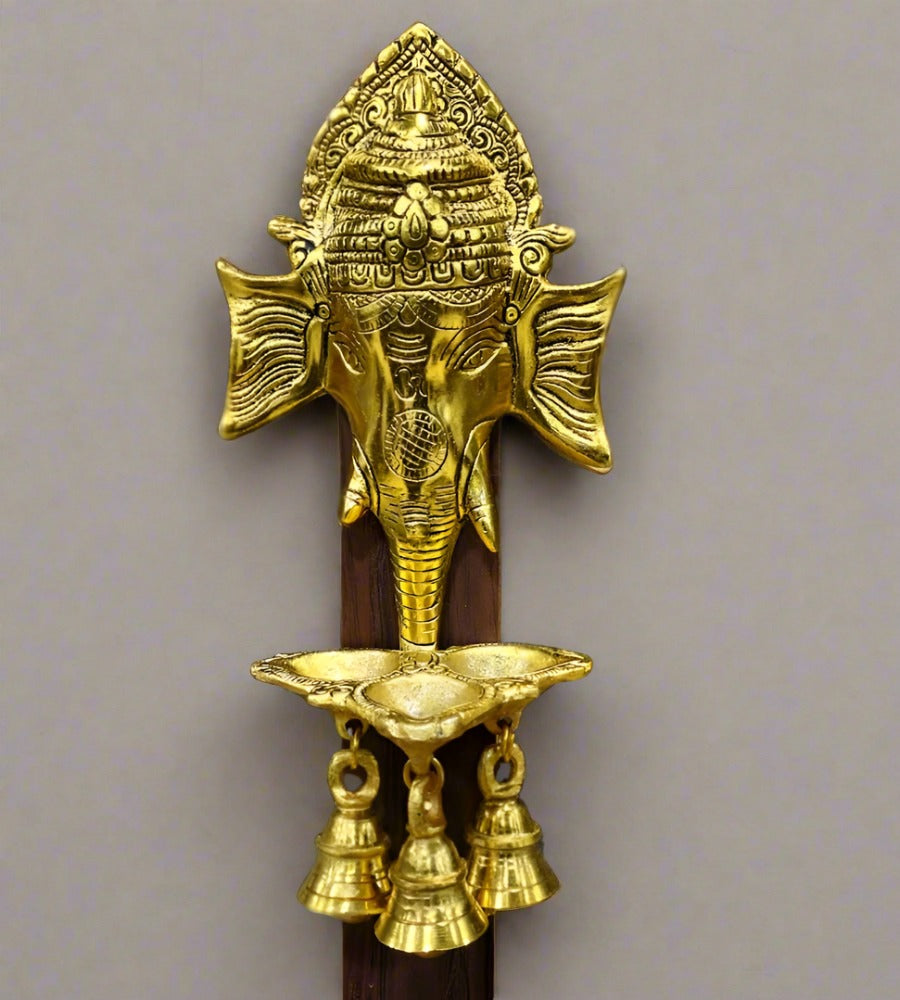 A spiritual Ganesha metal wall art piece, perfect for a pooja room or home temple.