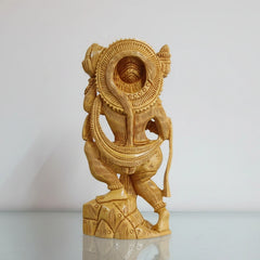 Traditional Indian wood carving of Lord Hanuman, perfect for temple altars.