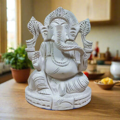 Elegant wooden Ganesha idol carved from sacred Shriparni wood
