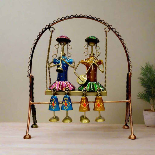 Hand-Painted Metal Art of Two Dolls on Jhula – Traditional Indian Swing Decor