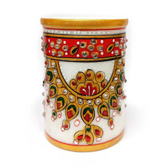 A pure white marble pen organizer with a unique and beautiful design.