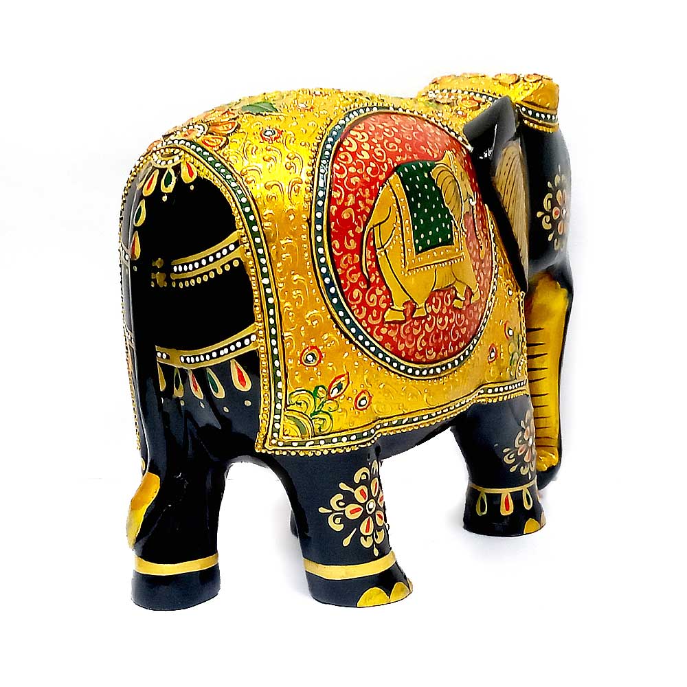 A unique wooden elephant showpiece with an intricately designed hand-painted embossing.