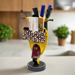 A very different and beautiful scooter-shaped pen stand, great for table decor.