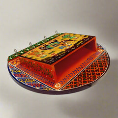 Traditional wooden key holder with colorful hand-painted artwork