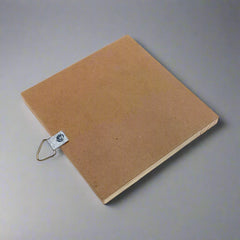 Decorative wooden key hanger with gemstone artwork adding sophistication to walls.