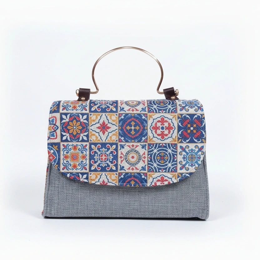 Women's floral embellished sling bag in high quality fabric with golden handle