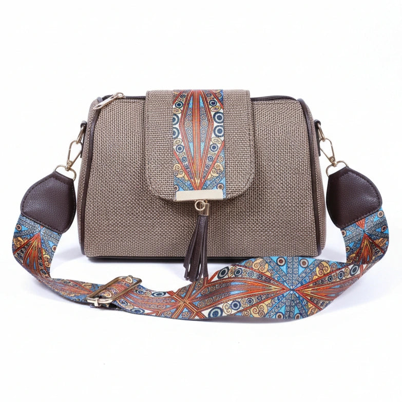 Women's jacquard crossbody sling bag with printed flap and leather tassel