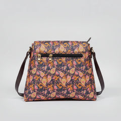 Rear view of the floral bag showing the slim profile and the secure zipper pocket designed for a woman's smartphone.