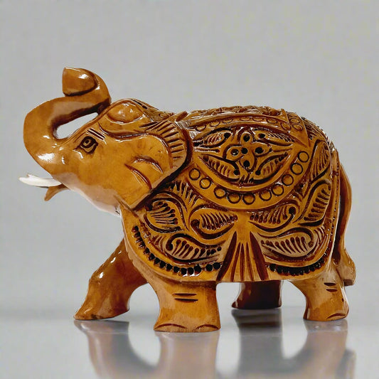 Handcrafted wooden salute elephant figurine in rich brown finish