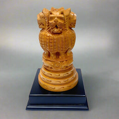 Detailed wood-carved Ashok Stambh decorative piece