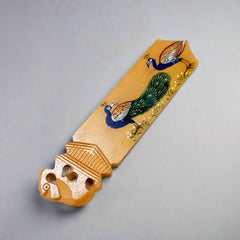 A wooden bookmark decorated with beautiful hand painting, a perfect gift for personal use or gifting.