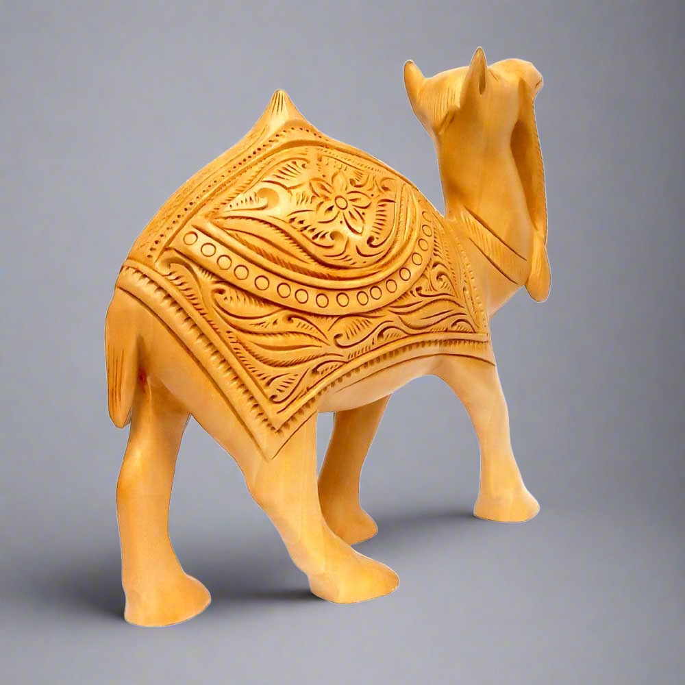 A decorative wooden camel showpiece that can also be used as a toy for kids.