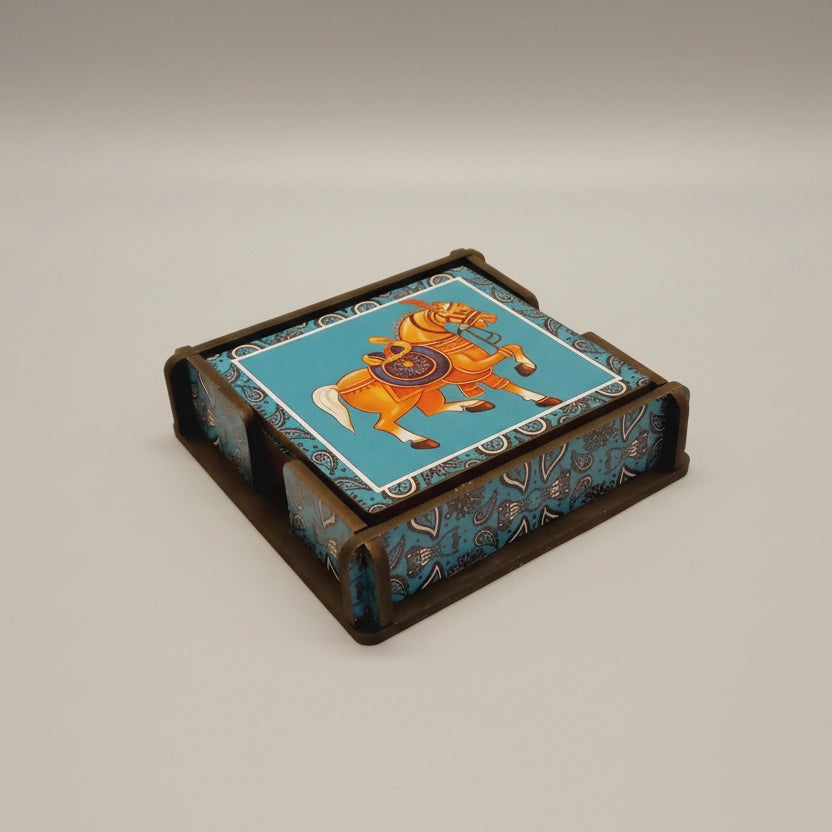 The wooden coaster set in its stand, presented as a gift with premium packaging for housewarming or birthdays.