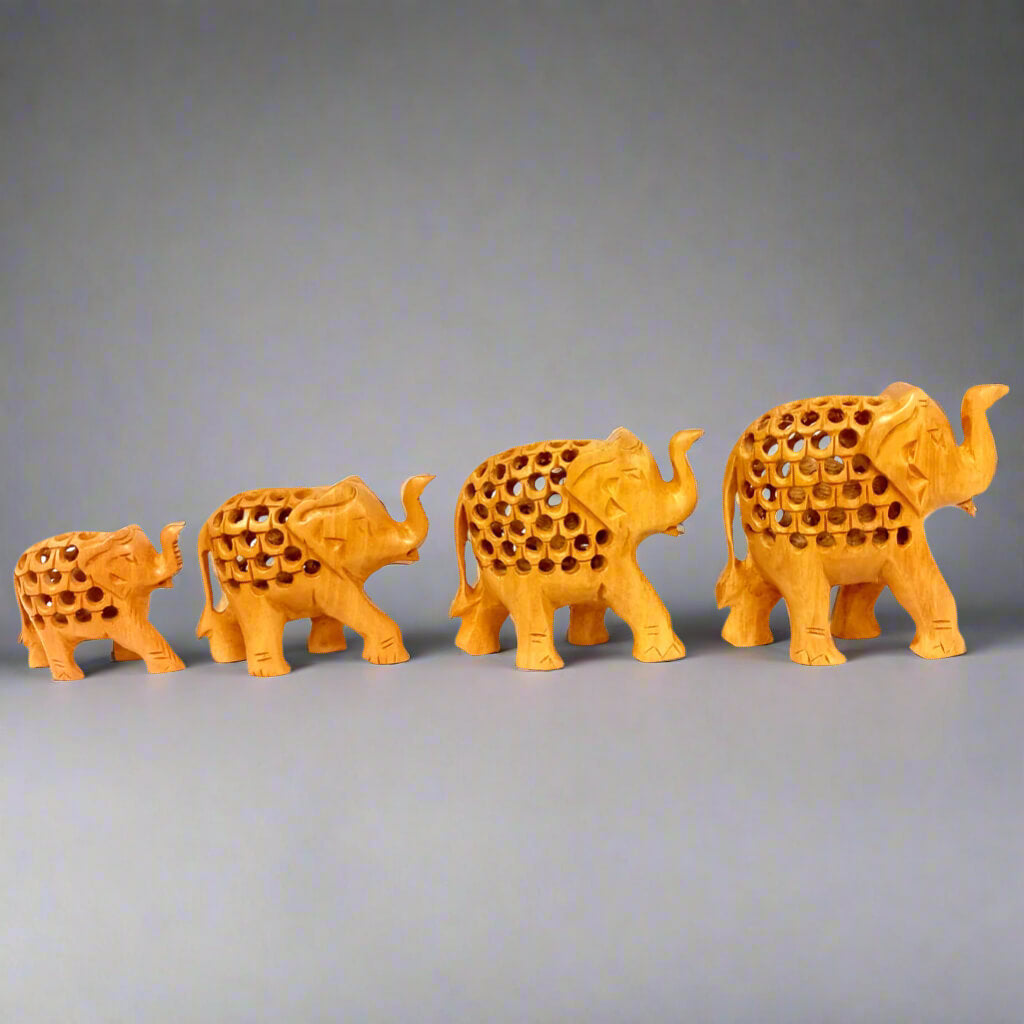 Handmade wooden elephant family set with fine lattice design