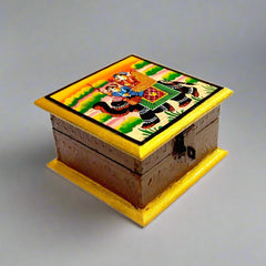 A wooden hand-painted jewelry box with a Raja Savari (elephant) painting on top.