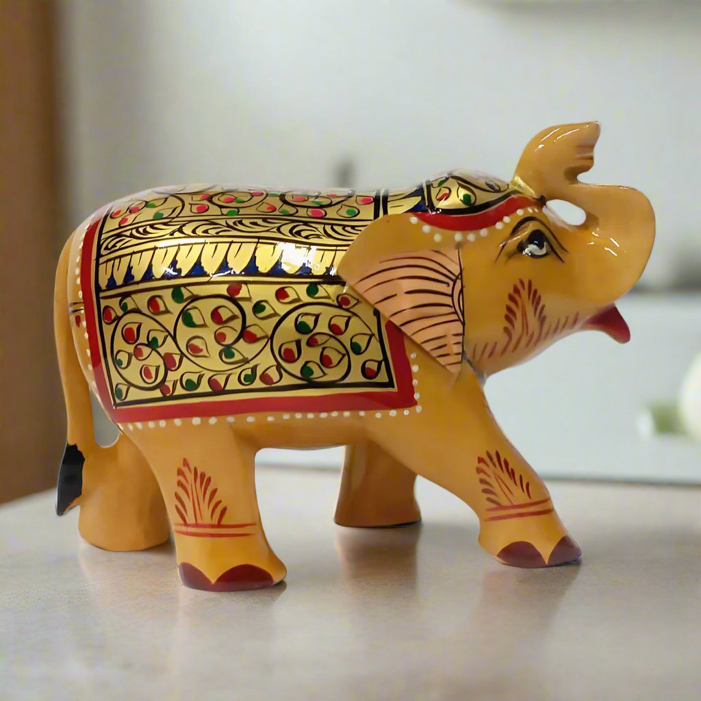 Hand-painted wooden salami elephant figurine crafted by artisans