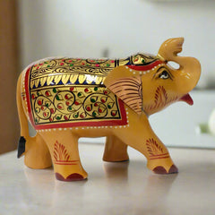 Hand-painted wooden salami elephant figurine crafted by artisans